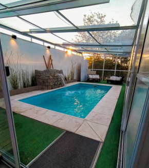 Гостиница Altos del Pucará Piscina Climatizada Hidromasaje Vista Panoamica juegos infantiles Huerta Orgánica PreViaje  Уэрта-Гранде